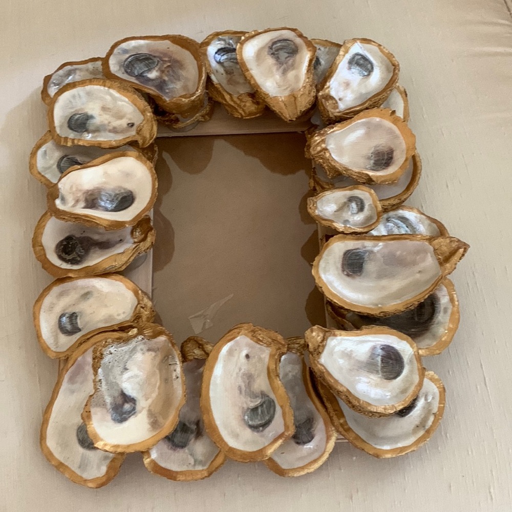 Hand worked gold leaf oyster frame.This piece of art is actually a 5by7 frame!